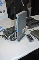 DSC_0012 UTStarcom IAD with 802.11, router/switch, single FXS port and per-port QoS for VoIP devices, e.g. SIP phones.